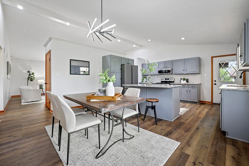 KitchenX A modern kitchen with blue-grey cabinets and new appliances